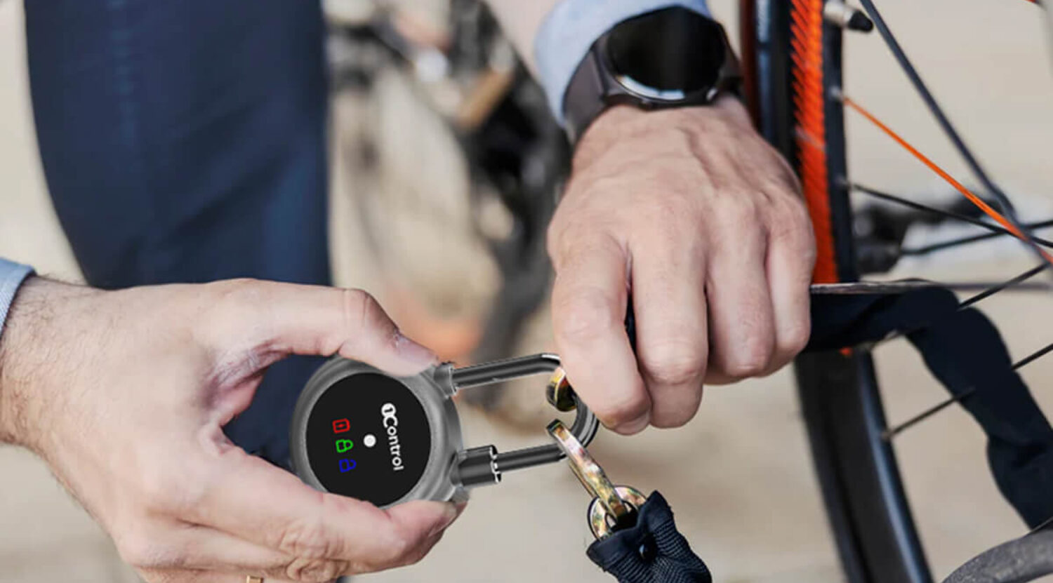 1Control LOCO smart padlock securing a bike in the bike storage room of a B&B